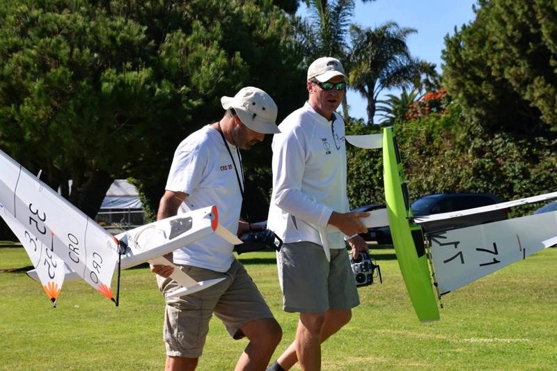 2016 IOM USA Nationals Champion Zvonko Jelacic from CRO and his proto Kantun 2 with its distinctive wide stern. He’s walking with Gary Boell and his Nitro by Jeff Byerley. It’s good to be tall in radio sailing. In my next life I want to come back tall like these Sequoias with the elevated viewing angle. Photo by Larry Kuechlin of Southside Photography.